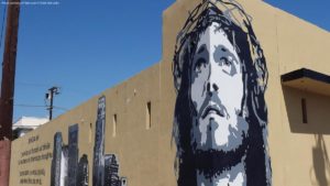 A wall mural of Jesus