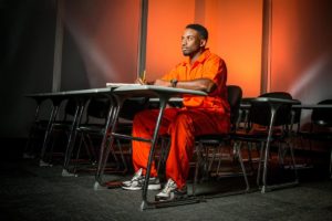 A Prisoner at a Desk