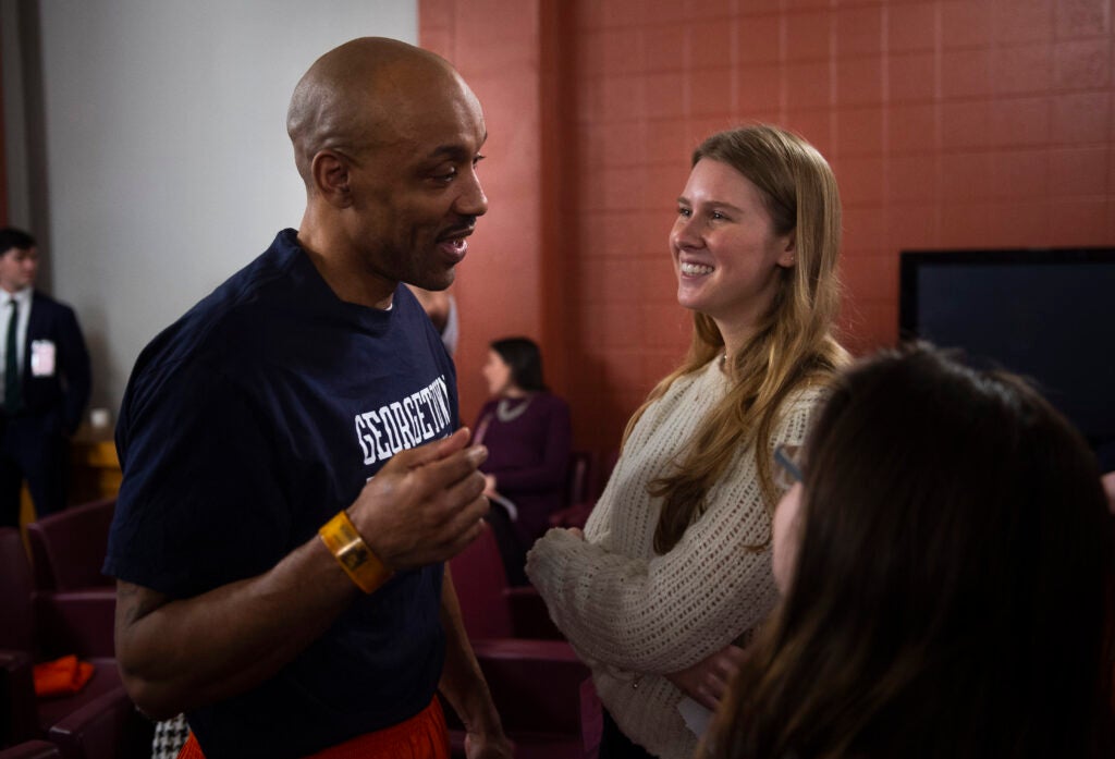 Ray chats with Frances Trousdale, a Georgetown undergraduate who participated in the Prisons and Punishment course, at the Fall 2019 Prison Scholars Program end of semester celebration.