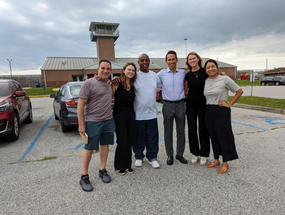Tray Jones (center left), celebrates his freedom with Marty Tankleff (far left), Marc Howard (center right), and the Making an Exoneree students who reinvestigated his case. 