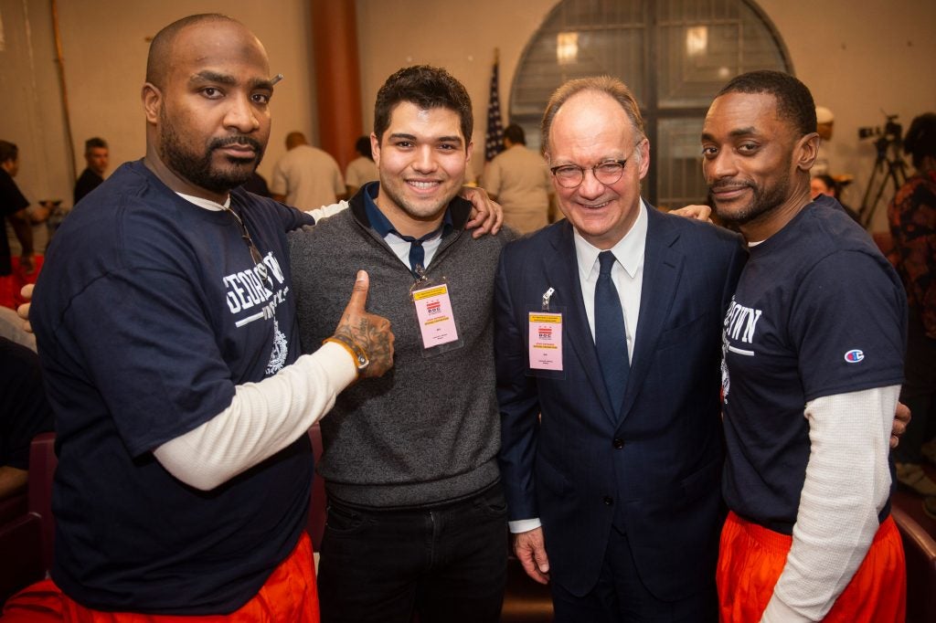 Warren Allen with Georgetown student Matt Calderon, Georgetown University President John DeGioia, and classmate Roy Middleton.