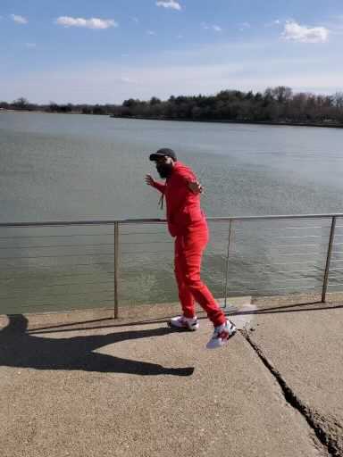 Warren Allen poses in front of the Potomac River.