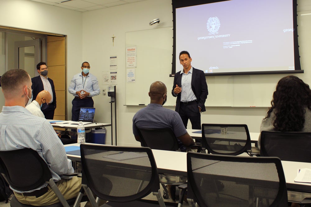 Marc Howard addresses the MORCA-Georgetown Paralegal Fellows