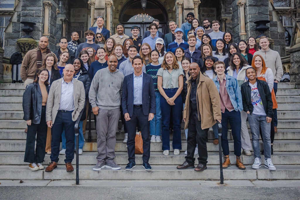 A large group of students, faculty, and guests