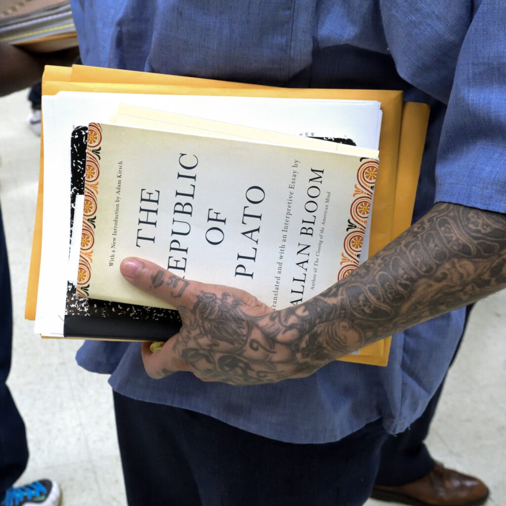 A man carries a copy of 